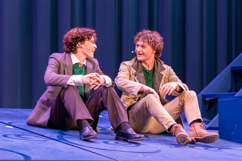 Students perform onstage